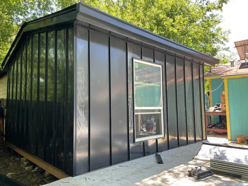 Black standing seam metal wall panels for Metal Roof Installation in Warsaw